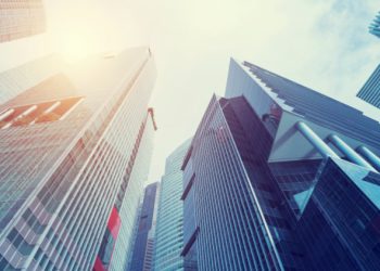 Low angle view of gleaming city skyscrapers